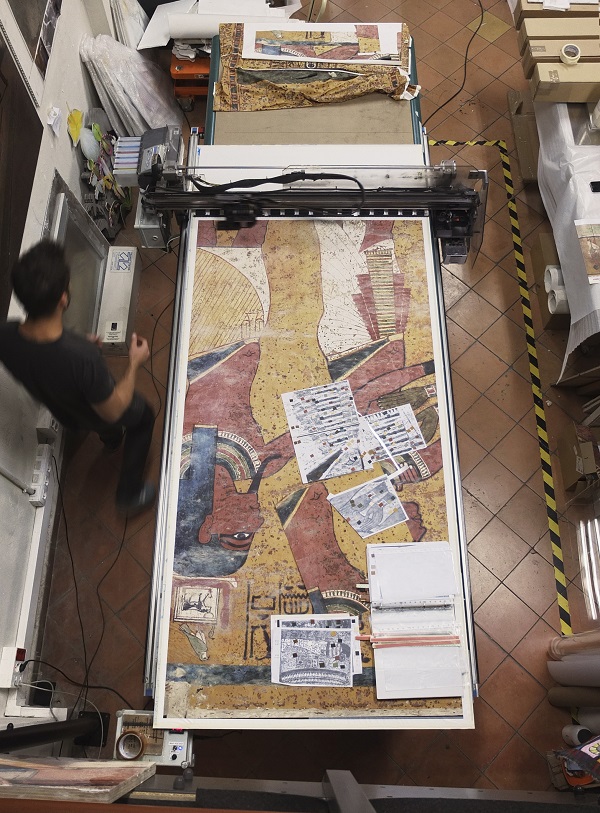 Re-materialising: printing the image onto diaphanous skin for the facsimile of Tutankhamun's tomb. The printing is done on a purpose built inkjet printer that can overprint in exact registration to ensure accuracy. Photo:© Factum Arte/Gabriel Scarpa