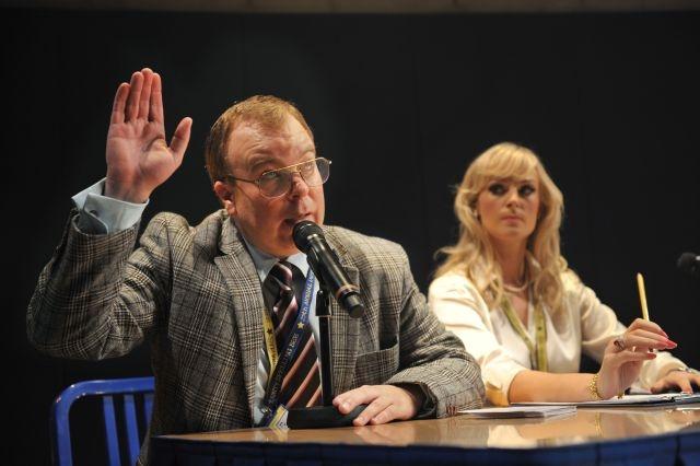 How do you spell win? Steve Pemberton brings on the next contestant, while Katherine Kingsley looks on