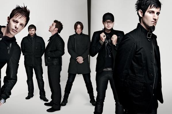 The full lineup of Pendulum, their facial hair as untrendy as their sound