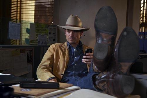 These boots were made for moseying: Timothy Olyphant puts his feet up in 'Justified'