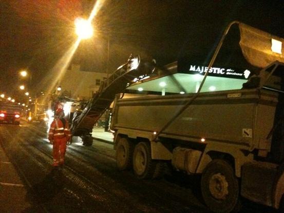 The Goldhawk Road crew at work late last night preparing the Goldhawk Road for road art