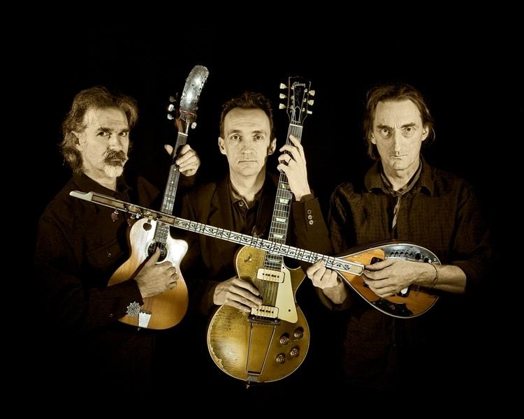 Well, would you buy a used barizouki from any of these men? From left to right: Mandelson, Adams and Edmonds