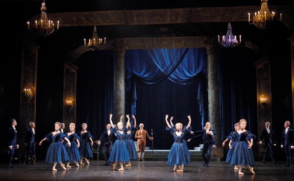 The ball scene designed by David Walker: 'the inky blue court theme allows Cinderella to arrive in her silvery tutu like the full moon in the night'