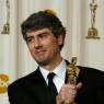 Composer Dario Marianelli wields his Oscar for his score to the film 'Atonement'