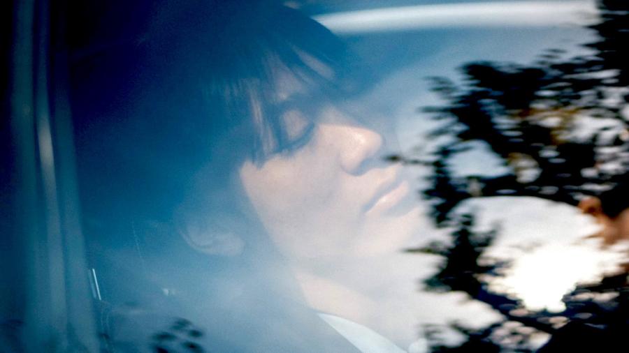 seen Through a glass darkly; Tenzin asleep in "At the End, the Rain Stops"