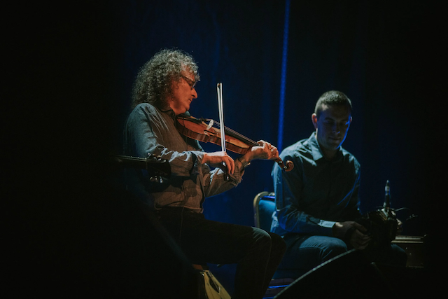 Martin Hayes, silhouetted