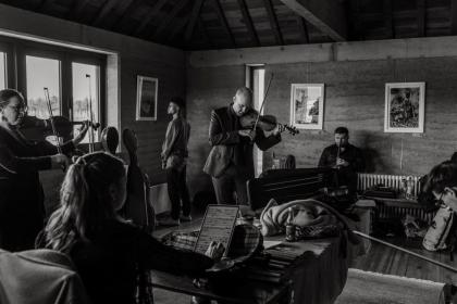 players in a room, black and white pic