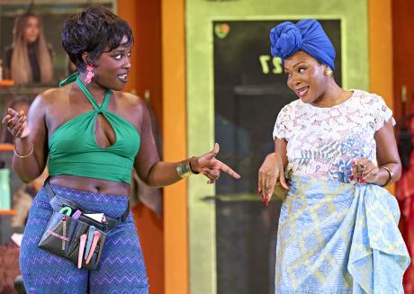 babirye bukilwa as Aminata, Dolapo Oni as Bea in Jaja's African Hair Braiding